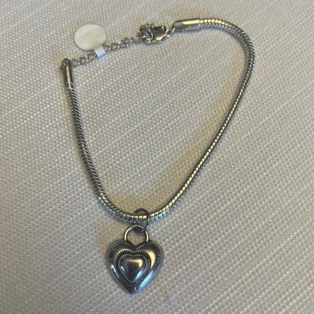 Handcrafted silver tone heart bracelet with added extender